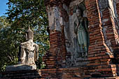 Ayutthaya, Thailand. Wat Mahathat, a small vihara with a chedi and a Buddha image near the eastern side of the eclosure. 